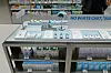 Sunscreen testers and skincare products arranged on shelves at Olive Young Central Myeongdong Town in Seoul.