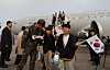 Korean nationals arrive at Seoul Air Base in Seongnam, Gyeonggi, on March 15, after being evacuated from Riyadh, Saudi Arabia, the first evacuation using a military plane since the conflict in the Middle East began late last month. A KC-330 Cygnus multirole aerial tanker carrying 204 Koreans and seven foreign nationals departed from Riyadh the day before, in an airlift operation named “Desert Shine.' [JOINT PRESS CORPS]