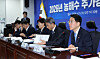 Government officials and lawmakers of the ruling Democratic Party hold a consultative meeting at the National Assembly in Yeouido, western Seoul, on April 1. [YONHAP]
