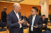 This photo provided by the International Transport Forum (ITF) shows Na Ki-ho, right, vice president of Hyundai Motor's policy coordination office, speaking with a participant during a session titled ″Steering Artificial Intelligence for Transport Resilience: Governance and Funding Pathways″ at the 2026 ITF Summit at the Congress Center Leipzig in Leipzig, Germany, on May 6. [YONHAP]