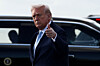 U.S. President Donald Trump gestures as he steps from Air Force One upon his arrival in West Palm Beach, Florida, on March 20. [REUTERS/YONHAP]