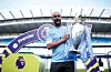 Manchester City manager Pep Guardiola celebrates with the trophy after winning the Premier League title at the Etihad Stadium in Manchester, Britain, on May 6, 2018. [REUTERS/YONHAP]