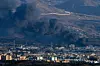 Smoke rises into the sky following an airstrike on Tehran on March 4. [UPI/YONHAP]
