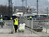Staff clean up Gwanghwamun Square in central Seoul on March 22 after a BTS comeback performance. [IM SOUNG-BIN]