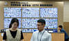 Officials work behind CCTV footage of the storage area for early voting ballot boxes at the National Election Commission’s election situation room in Gwacheon, Gyeonggi, on May 26. [NEWS1]