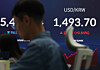 The dollar-won exchange rate is seen on an electronic board at the dealing room of Hana Bank in Jung District, central Seoul, on March 13. [YONHAP]