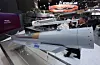 Visitors to the Hyundai Rotem booth examine a ducted ramjet engine and a hypersonic dual ramjet engine at the Seoul International Aerospace and Defense Exhibition at Kintex in Goyang, Gyeonggi, on Oct. 20, 2025. [NEWS1]