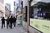 A banner in support of BTS hangs at a restaurant near Gwanghwamun Square in central Seoul on March 22. [YONHAP]