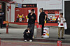 People smoke around an ashtray bin in Hongdae in Mapo District, western Seoul, on May 2. [SHIN MIN-HEE]