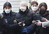 A woman suspected of giving a drug-laced drink that led to another person’s death at a motel in Gangbuk District, northern Seoul, attends a warrant review hearing at the Seoul Northern District Court in Dobong District, northern Seoul, on Feb. 12. [YONHAP]