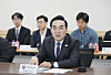 Budget Minister Park Hong-keun speaks during a meeting between domestic solar cell manufacturers and local government officials at the Hanwha Qcells plant in Jincheon County, North Chungcheong, on May 8. [MINISTRY OF PLANNING AND BUDGET]