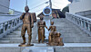 A statue depicting a family on their journey to seek refuge stands near the Provisional Capital Memorial Hall in Seo District, Busan. [WOO JI-WON]