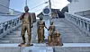 A statue depicting a family on their journey to seek refuge stands near the Provisional Capital Memorial Hall in Seo District, Busan. [WOO JI-WON]