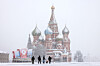 People walk across the Red Square in Moscow during a snowstorm on April 27. [TASS/YONHAP]