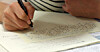 A test taker writes down answers for the Test of Proficiency in Korean, also known as the Topik, exam. [KIM SANG-SEON]
