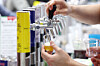 A booth staffer prepares beer samples at the Korea Beer Expo & Drink Seoul at Coex in Gangnam District, Seoul, on April 16. [YONHAP]