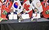 Flavio Volpe, the president of the Automotive Parts Manufacturers' Association in Canada, left, Son Jae-il, the CEO of Hanwha Aerospace, center, and Jung Seung-kyun, the vice president at Hanwha Ocean, pose for a photo after signing an MOU in Ontario, Canada, on April 29. [HANWHA AEROSPACE]