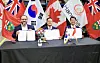 Flavio Volpe, the president of the Automotive Parts Manufacturers' Association in Canada, left, Son Jae-il, the CEO of Hanwha Aerospace, center, and Jung Seung-kyun, the vice president at Hanwha Ocean, pose for a photo after signing an MOU in Ontario, Canada, on April 29. [HANWHA AEROSPACE]