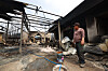 A man observes a destroyed garage in Uiseong County, North Gyeongsang, on March 27, 2025. His property was engulfed in a wildfire in March 2025. [YONHAP]