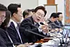 President Lee Jae Myung speaks with his aides during the 22nd Cabinet Meeting at the Blue House in Seoul on May 20. [JOINT PRESS CORPS]