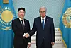 Presidential chief of staff Kang Hoon-sik, left, shakes hands with Kazakh President Kassym-Jomart Tokayev in Kazakhstan on April 8. Kang visited the Central Asian country as President Lee Jae Myung's special envoy as part of a three-nation tour and discussed boosting cooperation in energy, transport and logistics during the meeting with the Kazakh leader. [BLUE HOUSE]