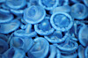 Condoms lie at the world’s top condom maker Karex’s facility in Malaysia on April 23. [REUTERS/YONHAP]