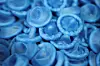 Condoms lie at the world’s top condom maker Karex’s facility in Malaysia on April 23. [REUTERS/YONHAP]
