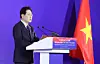 President Lee Jae Myung speaks at a bilateral business forum in Hanoi during his state visit to Vietnam on April 23. [JOINT PRESS CORPS]