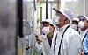 Hyundai Motor Group Executive Chair Euisun Chung, center, inspects its battery plant in Karawang Regency, Indonesia. [HYUNDAI MOTOR]