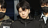 Jang Yun-gi, who is accused of killing a high school student whom he did not know in downtown Gwangju, is transferred from the Gwangju Seobu Police Precinct to prosecutors on May 14. [NEWS1]