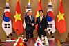 President Lee Jae Myung, right, shakes hands with Vietnamese leader To Lam during their summit at the presidential office in Yongsan, central Seoul, on Aug. 11. [JOINT PRESS CORPS]