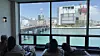 People sit by the window at a nearby cafe to look at Yeongdodaegyo Bridge on May 5. [WOO JI-WON]