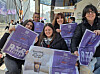 Fans pose with the BTS special edition of the Korea JoongAng Daily in central Seoul on March 21. [KIM MIN-YOUNG]
