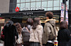 People walk past the Shinsegae department store main branch in central Seoul.