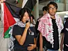 Activists Kim Ah-hyun, left, and Kim Dong-hyeon, who had been detained by the Israeli government, speak to reporters upon their arrival in Korea at Incheon International Airport on May 22. [YONHAP]