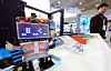 Visitors look around exhibition booths at the “2026 Korea Education Expo” held at COEX in Gangnam District, Seoul, on Feb. 21. The expo highlights changes in the education environment as it expands beyond the AI era toward artificial general intelligence and explores practical responses, with global big tech firms and leading domestic edtech companies showcasing the latest technologies that can be immediately applied in classrooms. [NEWS1]
