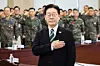 President Lee Jae Myung takes part in the national ceremony at a meeting of key military commanders at the Ministry of National Defense in Yongsan District, central Seoul, on March 27. [JOINT PRESS CORPS]