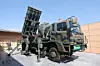 Operational personnel from Air Force Unit 8146 raise a launcher for the Cheongung-II, a medium-range surface-to-air missile system, into an upright position, on May 13. [NEWS1]