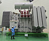 A worker stands in front of an ultra-high-voltage transformer by LS Power Solution. LS Power Solution signed a $70.26 million ultra-high-voltage transformer supply contract with a U.S. energy infrastructure company on April 6. [LS POWER SOLUTION]