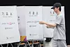 BTS member Jin walks into the voting booth at a polling station in Hannam-dong in Yongsan District, central Seoul, on June 3. [NEWS1]