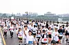 Participants run together during the “Disney Run Seoul 2025” event held at Yeouido Park, Yeongdeungpo District, western Seoul, on Oct. 12, 2025. [DISNEY KOREA]