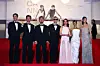 Director Na Hong-jin and cast members pose on the red carpet during arrivals for the screening of the film ″Hope″ in competition at the 79th Cannes Film Festival in Cannes, France, on May 17. From left are Zo In-sung, Hwang Jung-min, director Na, Michael Fassbender, Alicia Vikander, Taylor Russell and Jung Ho-yeon. [REUTERS/YONHAP]