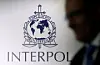 A man passes an Interpol logo in Singapore on Sept. 30, 2014, in this file photo unrelated to the story. [REUTERS/YONHAP]