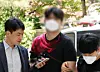 A man accused of carrying out a revenge-for-hire attack in Incheon arrives at the Incheon District Court on May 18 to attend a pretrial detention hearing. [YONHAP]