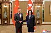North Korean Foreign Minister Choe Son-hui, right, shakes hands with Chinese Foreign Minister Wang Yi during their meeting in Pyongyang on April 9 in this photo released by the North's state-controlled Korean Central News Agency the following day. [YONHAP]