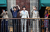 Members of BTS and Mexico's President Claudia Sheinbaum, far right, greet fans as they stand on a balcony of the National Palace in Mexico City on May 6, ahead of the ″Arirang″ world tour concerts. [REUTERS/YONHAP]