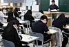 Third-year high school students take the National United Academic Ability Assessment at Dongtan High School in Hwaseong, Gyeonggi, on May 7. [NEWS1]