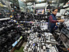 Lee Kyu-tae, 68, organizes vintage digital cameras on the shelves of his shop inside Sewoon Plaza in Jongno District, central Seoul, on May 20. [IM SOUNG-BIN]