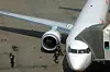 A plane is parked at a gate at Incheon International Airport on March 16. [YONHAP]