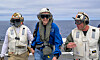 This handout image released by NASA shows NASA Administrator Jared Isaacman, center, is greeted by Captain Erik Kenny, commanding officer, USS John P. Murtha, right, as he arrives on the USS John P. Murtha for the rocovery of Artemis II crewmembers and NASA's Orion spacecraft in the Pacific Ocean off the coast of San Diego, California on April 10. [AFP/YONHAP]